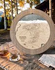 Weathered Timber Revelstoke ski map cribbage board outdoors with playing cards and whiskey glasses for après-ski game night.