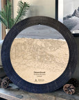 Matte Onyx Steamboat ski map cribbage board displayed with pinecones as modern ski cabin décor.