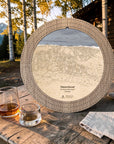 Weathered wood Steamboat ski map cribbage board outdoors with whiskey glasses and cards for après-ski game night.