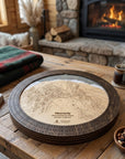 Heavenly Lake Tahoe wooden ski map cribbage board staged for game night in a cozy mountain cabin with coffee and fireplace.