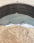 Detailed view of the engraved Heavenly ski resort trail map on the handcrafted wooden cribbage board.