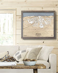 Framed artwork of 49° North Ski Resort on a wood wall in a rustic ski cabin. 