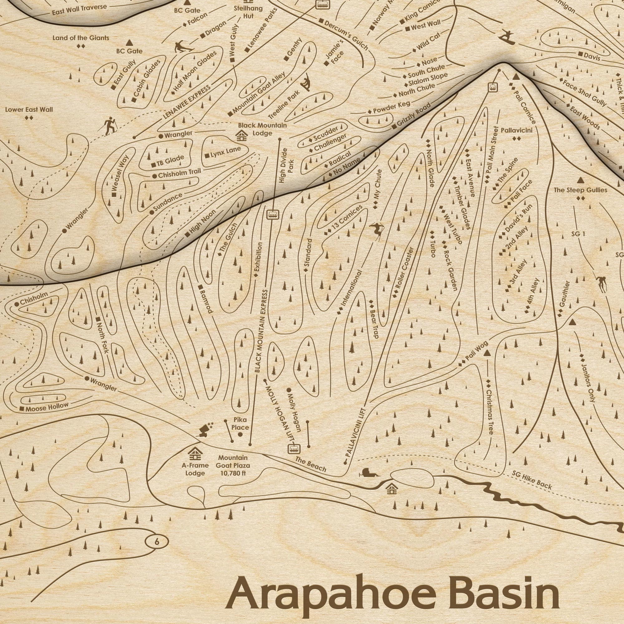 Close-up of the Arapahoe Basin wooden ski trail map showing engraved runs, chairlifts, mountain landmarks, and dimensional terrain.