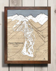 Framed map of Aspen Highlands on a wooden surface. 3D Laser-cut wooden ski map. 