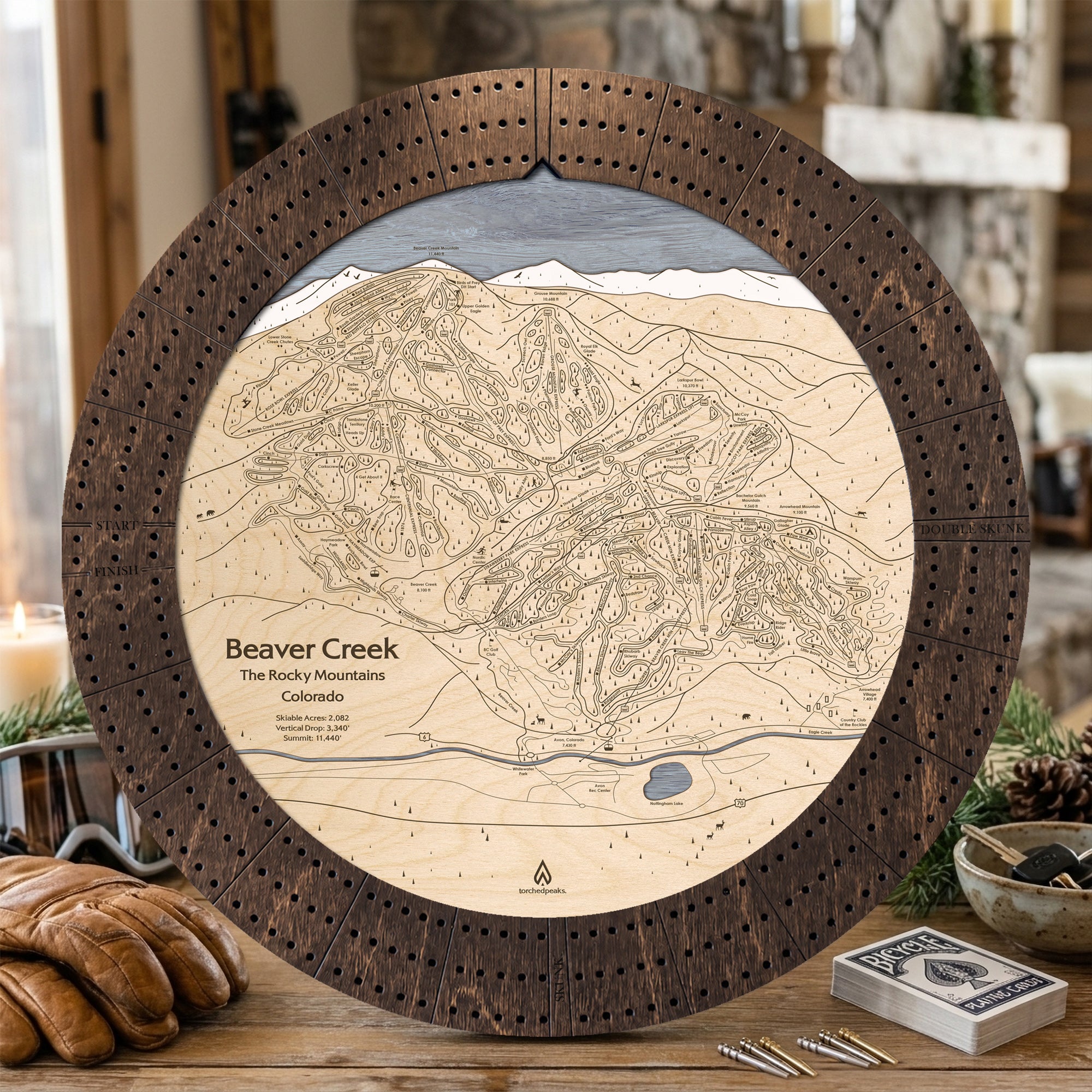 Rustic Mocha Beaver Creek wooden cribbage board staged for game night in a warm mountain lodge.