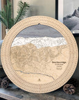 Birch Breckenridge wooden ski map cribbage board displayed with pinecones and greenery as ski cabin décor