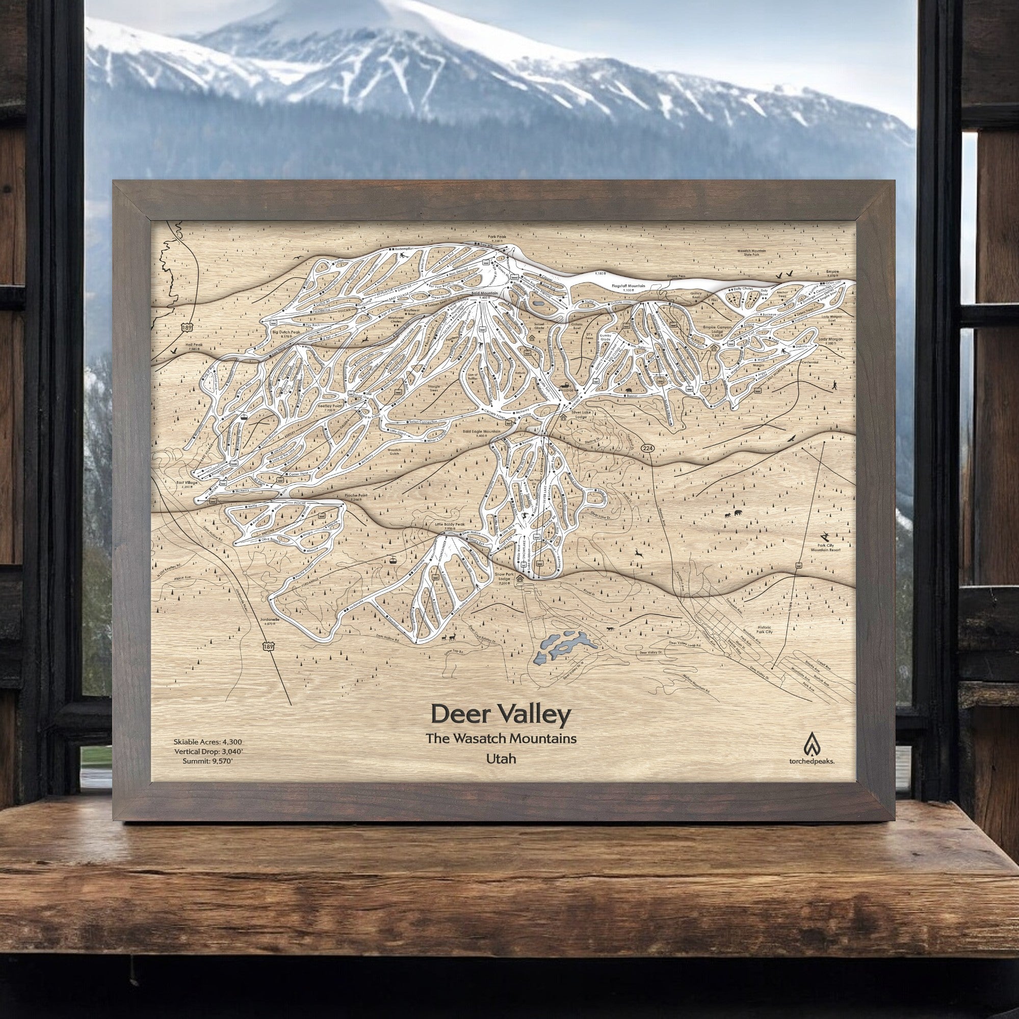 Framed wooden artwork of Deer Valley Ski Area with mountain background