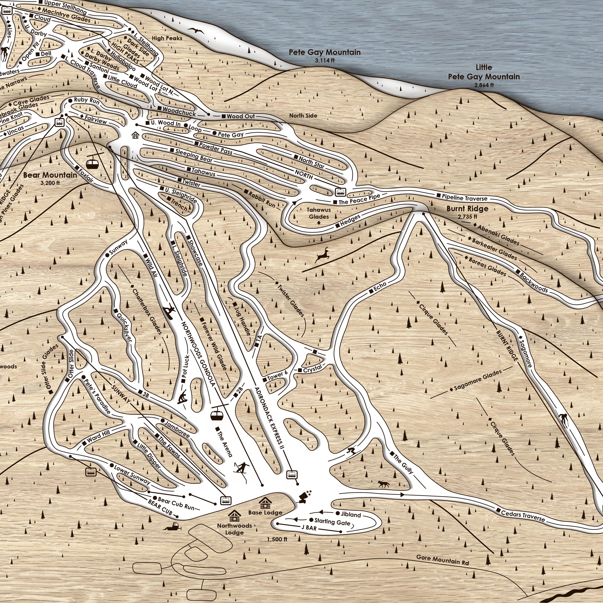 Ski resort map with trails and mountain features laser engraved in separate layers of wood. 