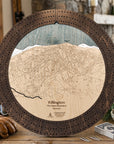 Killington ski map cribbage board in Rustic Mocha styled on a cabin table with playing cards.