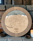 Killington cribbage board in Weathered Timber beside a stone fireplace with candles and pinecones