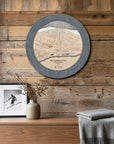Round Quechee Club ski trail map cribbage board mounted on a reclaimed-wood wall as a handcrafted gift for skiers.