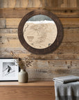 Round Revelstoke ski map cribbage board mounted on a reclaimed-wood wall as distinctive ski cabin decor.