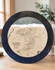 Matte Onyx Revelstoke ski trail map cribbage board displayed on a light wood table in a modern ski home.