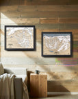 Framed Ski Resort artwork on a rustic wood wall inside a cozy ski cabin. 