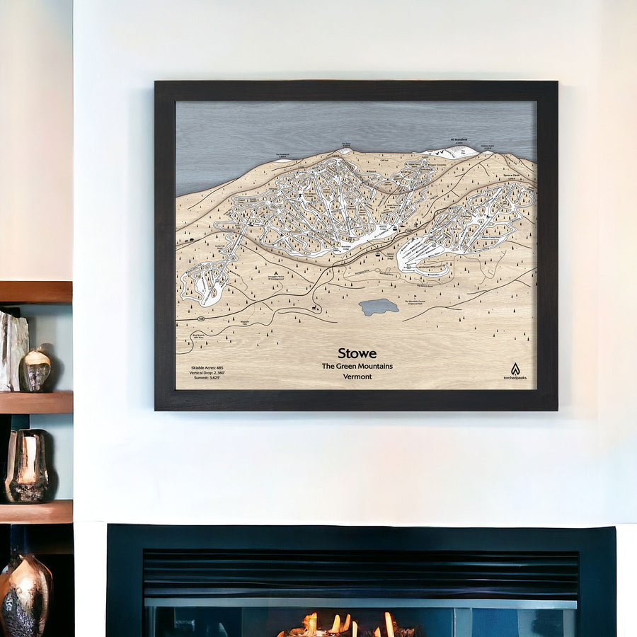 Gift for Skiers: 3D Wooden Ski Trail Map of Stowe VT hanging above a fireplace. 