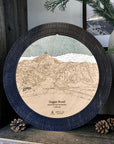 Sugar Bowl wooden cribbage board in Matte Onyx displayed with mountain décor and pinecones.