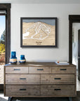 Framed Terry Peak ski resort map on a white wall in a modern ski house. 
