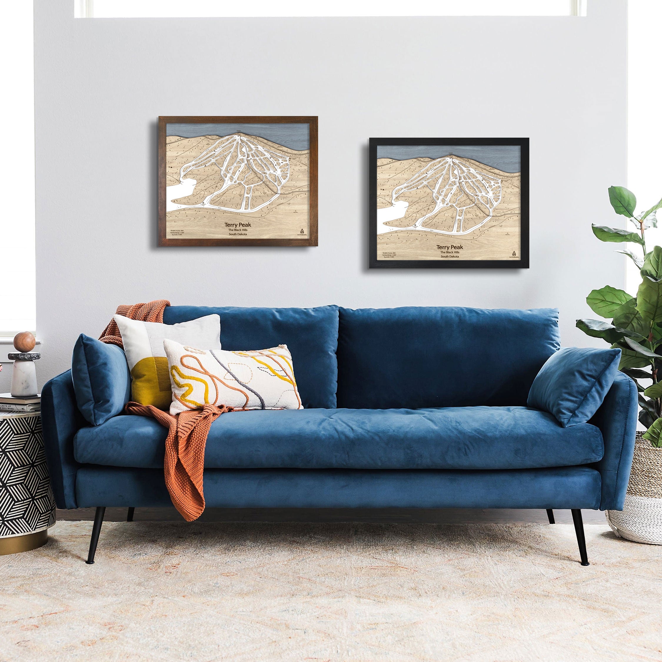 Terry Peak Ski Map artwork on a white wall in a modern ski house. 