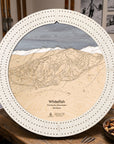 Arctic White Whitefish ski map cribbage board staged in a mountain home as a unique gift for skiers.