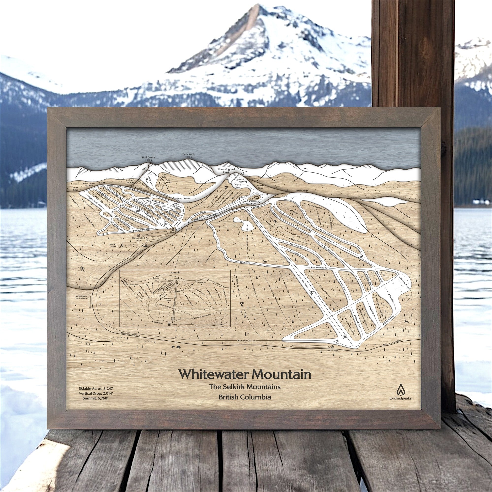 3D Wooden map of Whitewater Ski Area with a mountainous landscape in the background