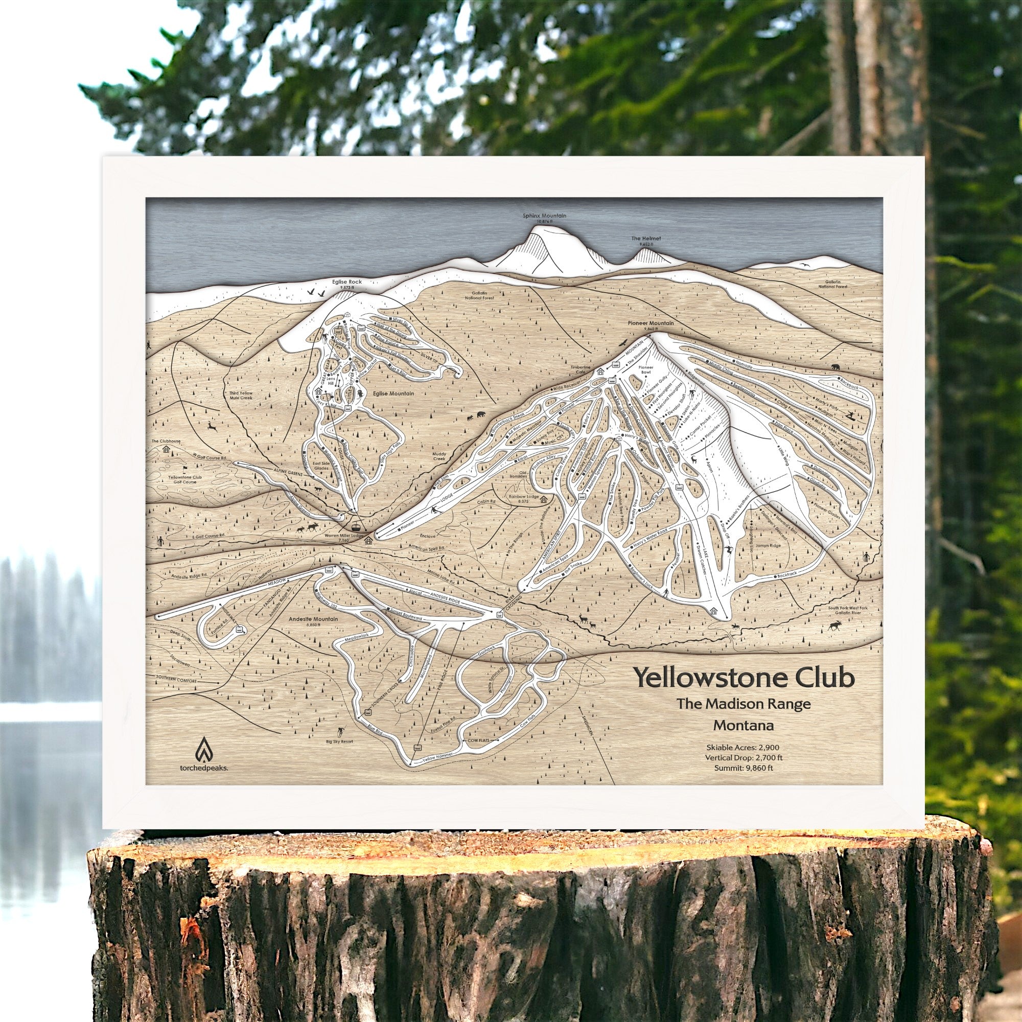 3D Wooden map of Yellowstone Club Ski Resort on a wooden stump with a natural background