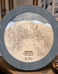 Heavenly ski map cribbage board showcased in an après-ski mountain home with fireplace and cabin furnishings