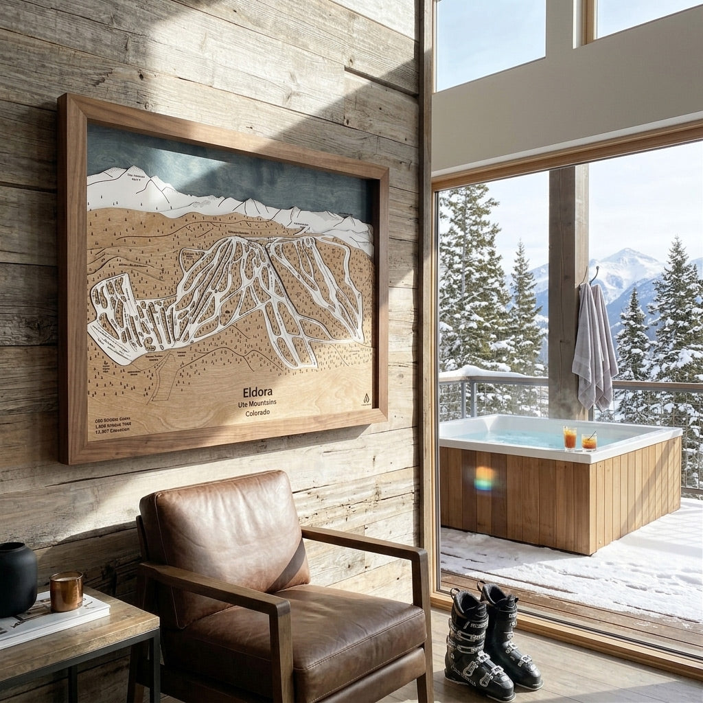 Handcrafted Eldora Colorado ski map displayed beside an outdoor hot tub in a luxury mountain cabin.