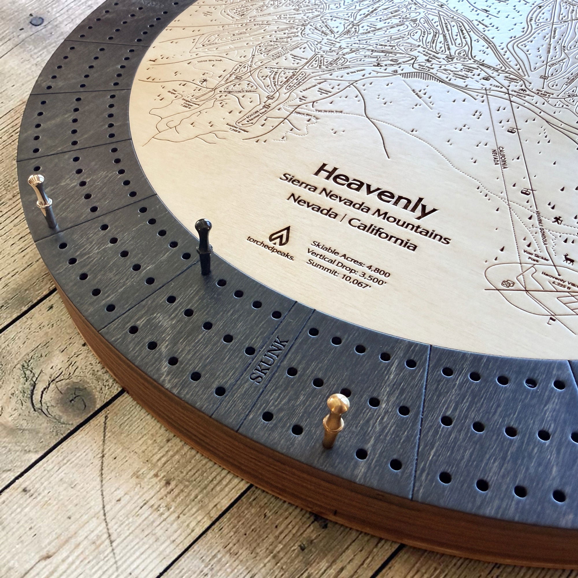 Custom Ski Map Cribbage Board handcrafted from layered wood with engraved ski resort trails and a 3-player cribbage layout.