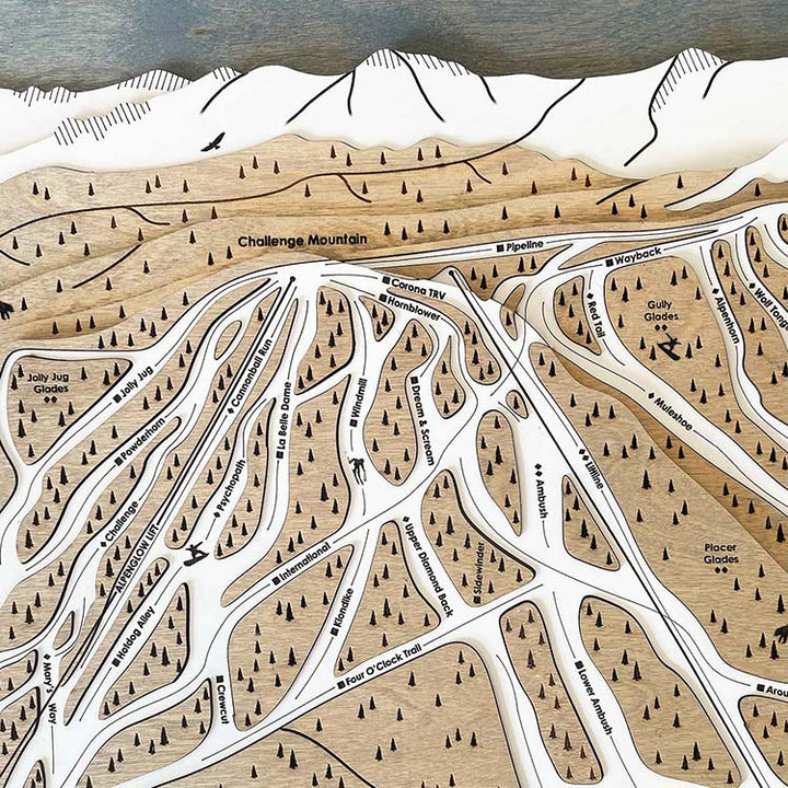 Torched Peaks laser engraved ski trail maps feature intricate details.